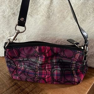 Multi colored coach mini bag.